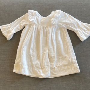 Girls white long sleeve The Oaks corduroy dress.